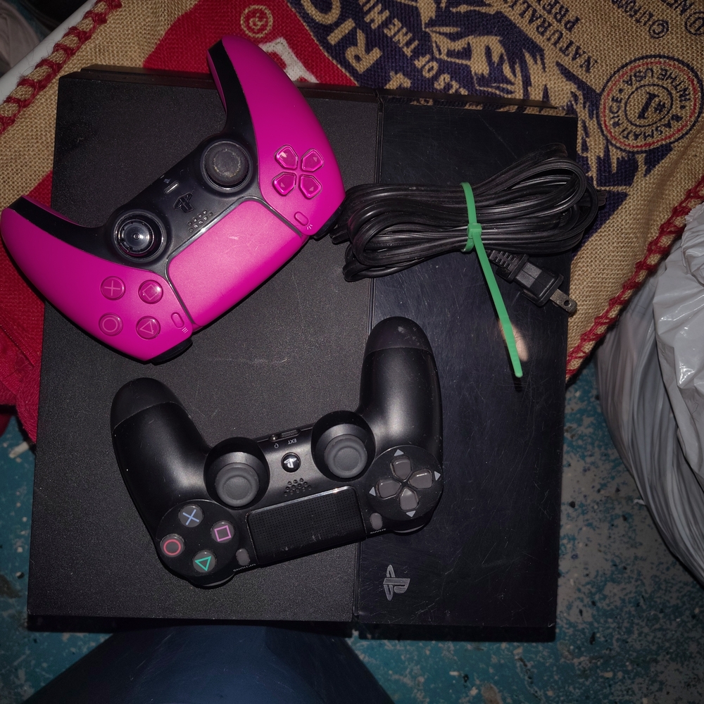 PlayStation Console Bundle with Pink and Black Wireless Controllers